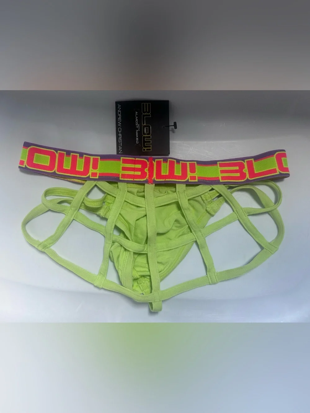 Andrew Christian…  Neon Lime Cage Briefs with Bold Logo Waistband
